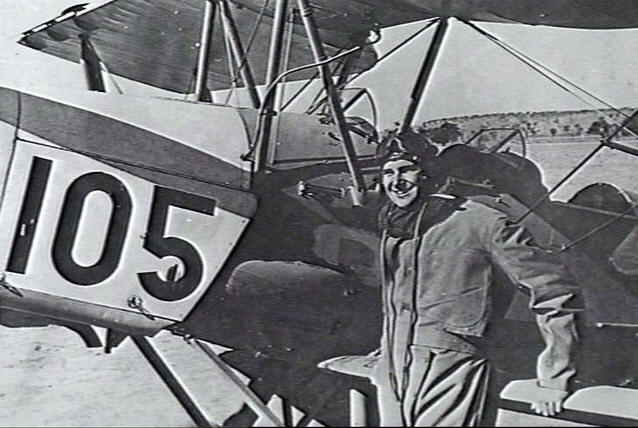 NARRANDERA, NSW. 1941-05. STANDING BESIDE HIS AIRCRAFT IS 403564 LEADING AIRCRAFTMAN JOHN KEITH DOUGLAS AT NO. 8 ELEMENTARY FLYING TRAINING SCHOOL. HE WAS KILLED NEAR MUNSTER, GERMANY, AFTER ...