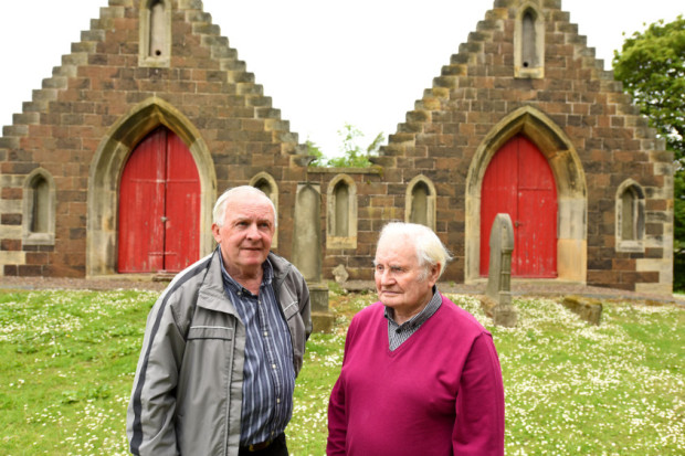 Remembering a war hero, Leslie historian Campbell Morris, right, with fellow resident Brian Coyle at the Douglas mausoleum. Pic: FPA