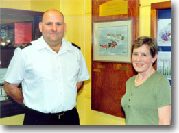 Chief Petty Officer Mike Christopher with artist Penelope Douglas.